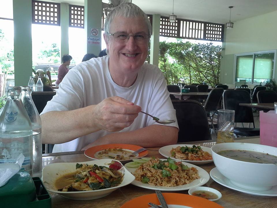 Dan Ogilvie eating lunch in Saraburi, Thailand