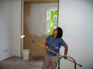 Ploy painting the ceiling
